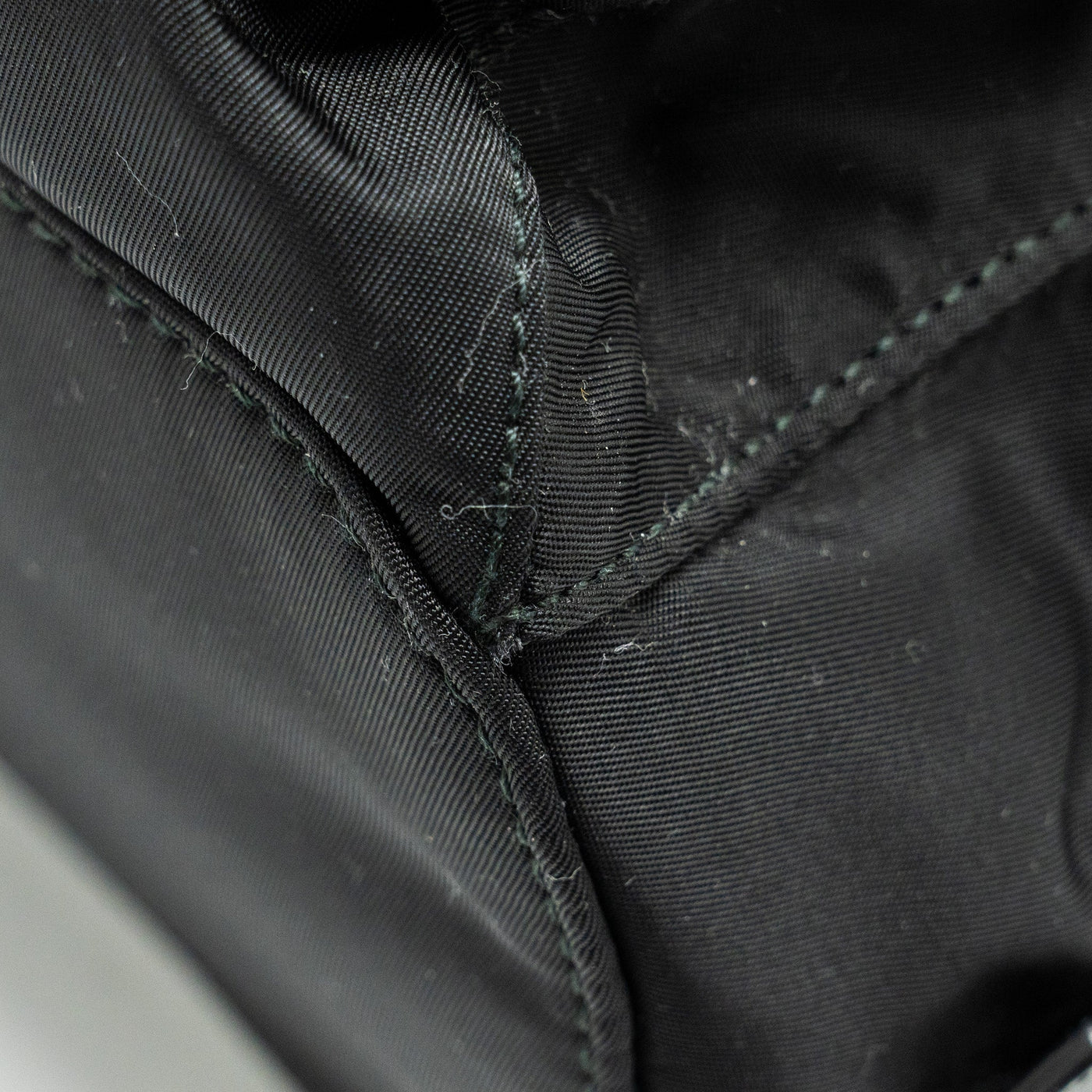 PRADA SMALL RE-NYLON BACKPACK BLACK SHW