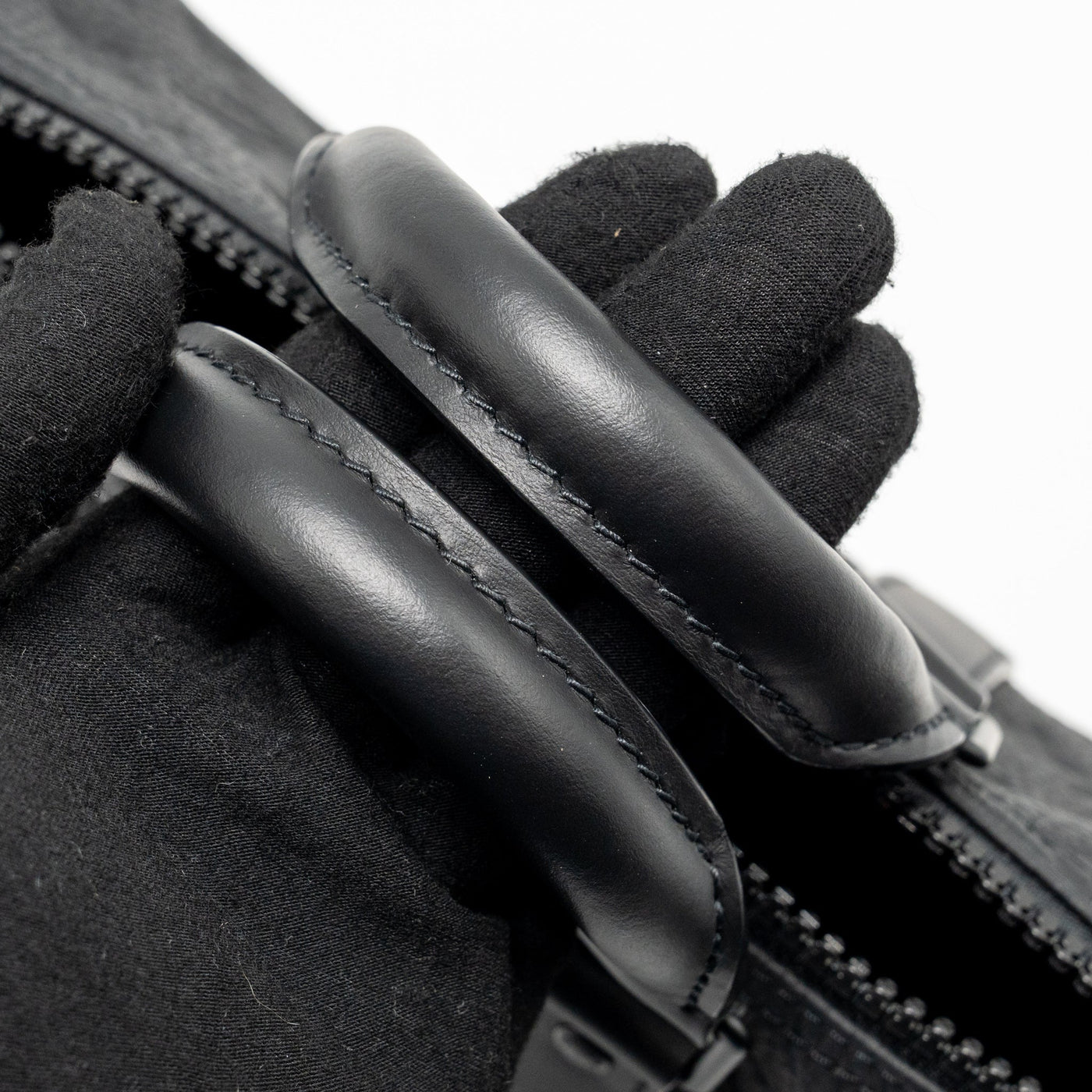 LOUIS VUITTON KEEPALL BANDOULIERE 25 MONOGRAM TAURILLON LEATHER BLACK WITH BLACK HARDWARE