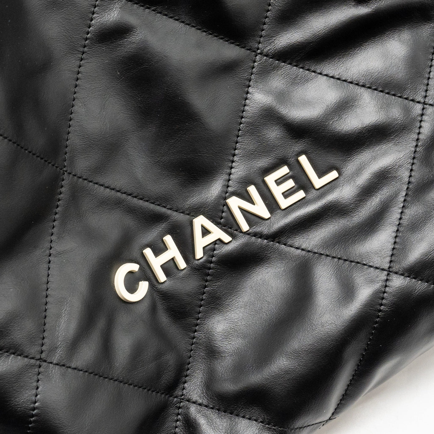 CHANEL 22 BACKPACK WHITE LETTER LOGO SHINY CALFSKIN BLACK GHW (MICROCHIP)