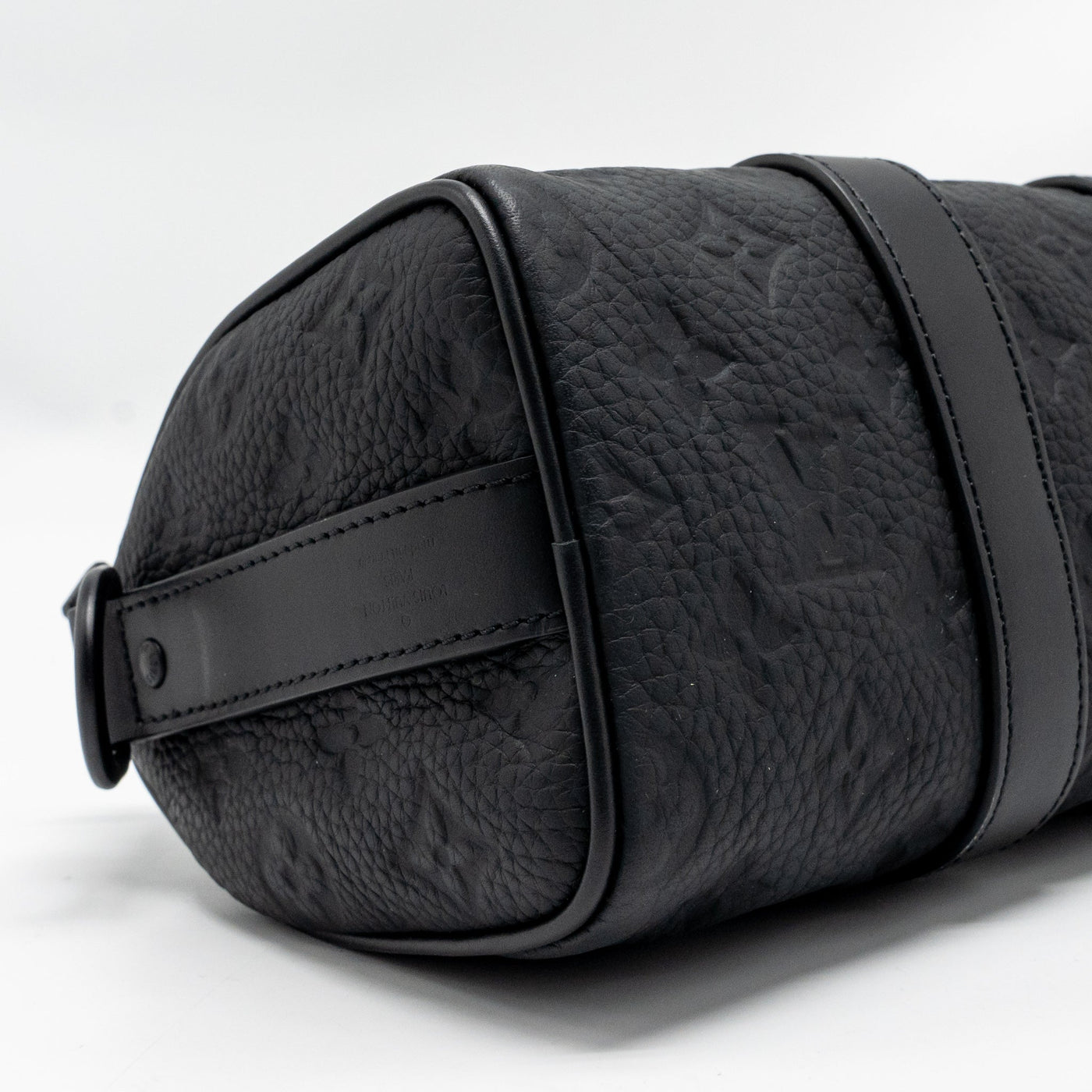 LOUIS VUITTON KEEPALL BANDOULIERE 25 MONOGRAM TAURILLON LEATHER BLACK WITH BLACK HARDWARE