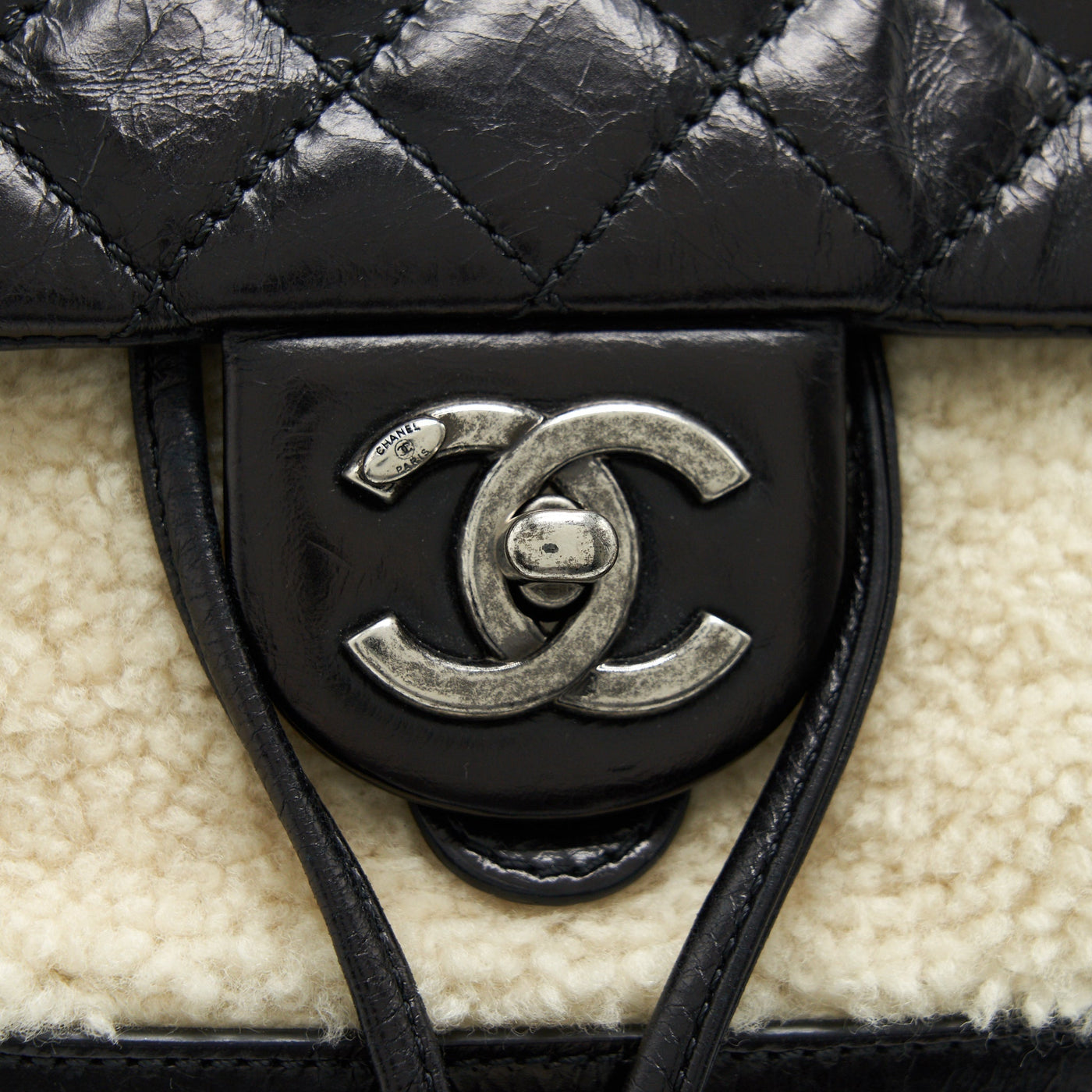 CHANEL MOUNTAIN SMALL BACKPACK SHEARLING WITH QUILTED CALFSKIN RUTHENIUM HARDWARE